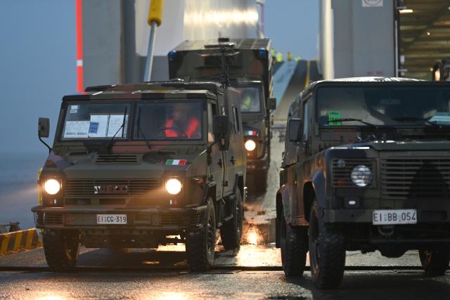 15 January 2026, Lower Saxony, Emden: Italian soldiers arrive with equipment and vehicles as The North Atlantic Treaty Organization (NATO) launches 'Steadfast Dart,' its largest multinational exercise of the year. Photo: Lars Penning/dpa