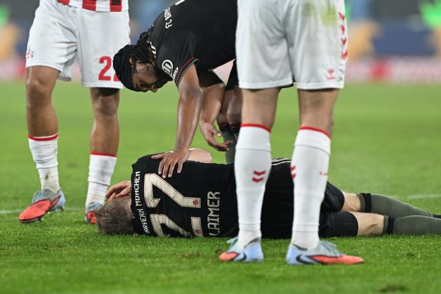 FILED - 14 January 2026, North Rhine-Westphalia, Cologne: Bayern Munich's Konrad Laimer lays injured on the pitch 
during the German Bundesliga soccer match between 1. FC Cologne and Bayern Munich at RheinEnergieStadion. Bayern Munich will be without Konrad Laimer for upcoming games due to a left calf muscle tear, the Bundesliga leaders said on Thursday. Photo: Federico Gambarini/dpa - IMPORTANT NOTICE: DFL and DFB regulations prohibit any use of photographs as image sequences and/or quasi-video.
