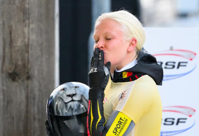 16 January 2026, Saxony, Altenberg: Belgium's Kim Meylemans reacts after finishing third in the women's skeleton World Cup singles second run. Photo: Robert Michael/dpa