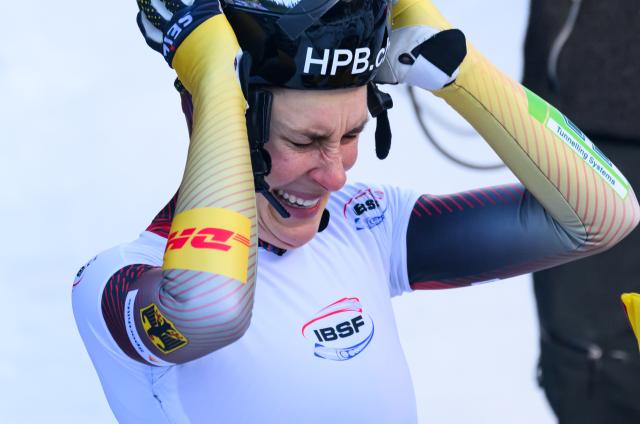 16 January 2026, Saxony, Altenberg: Germany's Jacqueline Pfeifer celebrates after winning the women's skeleton World Cup singles second run. Photo: Robert Michael/dpa