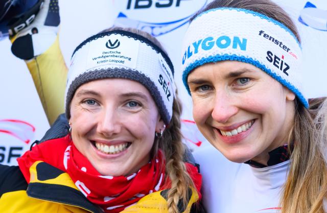 16 January 2026, Saxony, Altenberg: Germany's winner Jacqueline Pfeifer (R) and runner-up Susanne Kreher stand on the podium after the women's skeleton World Cup singles second run. Photo: Robert Michael/dpa