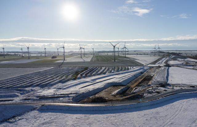 FILED - 16 December 2022, Schleswig-Holstein, Fehmarn: A view of the construction work on the rail route to the Fehmarn Belt Tunnel. The Fehmarn Belt Tunnel linking Germany and Denmark is now expected to open no earlier than 2031, pushing the ambitious cross-border project at further behind schedule. Photo: Christian Charisius/dpa