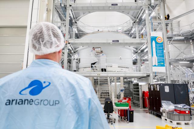 FILED - 18 November 2025, Bremen: Employees work on an intertank structure of the upper stage of an Ariane 6 launcher at the Ariane Group plant in Bremen. Ariane Group plans to double the number of launches of its Ariane 6 carrier rocket this year. Photo: Hauke-Christian Dittrich/dpa