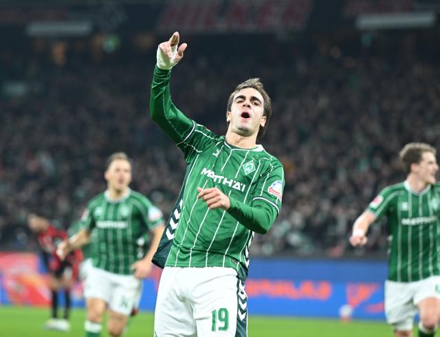 16 January 2026, Bremen: Werder Bremen's Jovan Miosevic celebrates scoring his side's third goal during the German Bundesliga soccer match between Werder Bremen and Eintracht Frankfurt at Weser Stadium. Photo: --/dpa - IMPORTANT NOTE: In accordance with the regulations of the DFL German Football League and the DFB German Football Association, it is prohibited to utilize or have utilized photographs taken in the stadium and/or of the match in the form of sequential images and/or video-like photo series.