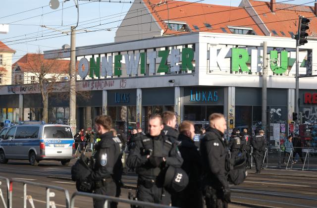 17 January 2026, Saxony, Leipzig: Police officers stand at an intersection in Leipzig's Connewitz district. Several left-wing demonstrations are planned for Saturday, with police preparing a large-scale operation amid expectations of heightened tensions. Photo: Sebastian Willnow/dpa