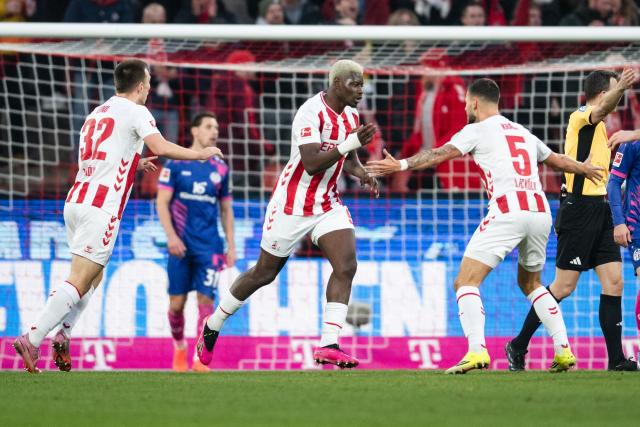 17 January 2026, North Rhine-Westphalia, Cologne: Cologne's Kristoffer Lund celebrates scoring his side's first goal during the German Bundesliga soccer match between 1. FC Cologne and FSV Mainz 05 at RheinEnergieStadion. Photo: Marius Becker/dpa - IMPORTANT NOTE: In accordance with the regulations of the DFL German Football League and the DFB German Football Association, it is prohibited to utilize or have utilized photographs taken in the stadium and/or of the match in the form of sequential images and/or video-like photo series.