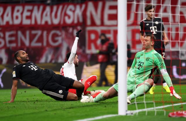 17 January 2026, Saxony, Leipzig: Leipzig's Romulo (C) scores his side's first goal during the German Bundesliga soccer match between RB Leipzig and Bayern Munich at rhe Red bull Arena. Photo: Jan Woitas/dpa