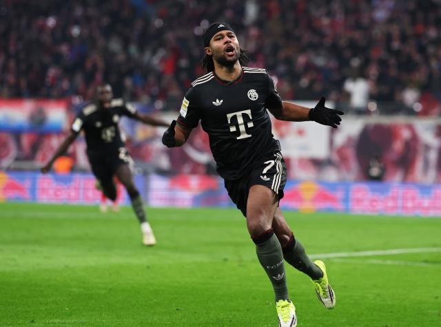 17 January 2026, Saxony, Leipzig: Bayern Munich's Serge Gnabry celebrates scoring his side's first goal during the German Bundesliga soccer match between RB Leipzig and Bayern Munich at rhe Red bull Arena. Photo: Jan Woitas/dpa