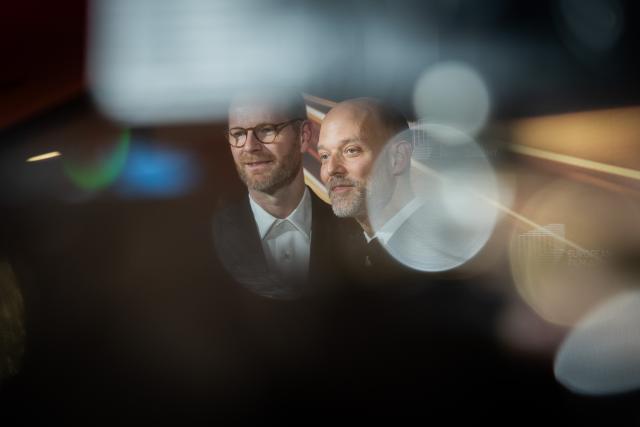 17 January 2026, Berlin: Norwegian film directors Eskil Vogt and Joachim Trier are honored in the "European Screenwriter" category at the 38th European Film Awards at the Haus der Kulturen der Welt. Photo: Christoph Soeder/dpa