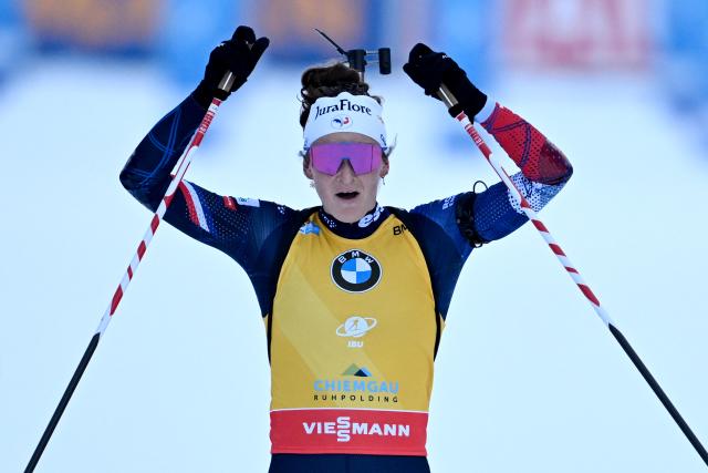 18 January 2026, Bavaria, Ruhpolding: France's Lou Jeanmonnot celebrates her victory at the finish line of the Women's 10 km pursuit competition of the IBU Biathlon World Cup. Photo: Sven Hoppe/dpa
