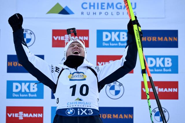 18 January 2026, Bavaria, Ruhpolding: Norway's Johannes Dale-Skjevdal celebrates at the award ceremony after winning the Men's 12.5 km pursuit competition of the IBU Biathlon World Cup. Photo: Sven Hoppe/dpa