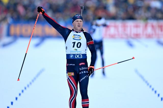 18 January 2026, Bavaria, Ruhpolding: Norway's Johannes Dale-Skjevdal celebrates his victory at the finish line of the Men's 12.5 km pursuit competition of the IBU Biathlon World Cup. Photo: Sven Hoppe/dpa