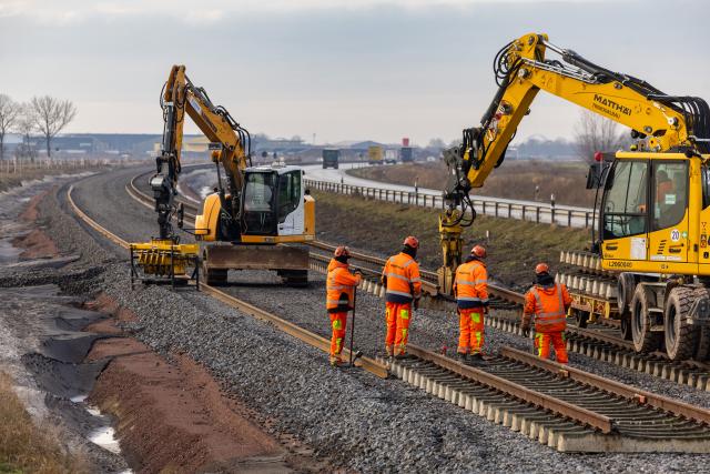 FILED - 16 January 2026, Schleswig-Holstein, Puttgarden: A temporary track bed is being set up for the rail connection to the Fehmarn Belt Fixed Link. Realizing the megaprojects of the Trans-European Transport Network (TEN-T) will take longer than originally planned, the European Court of Auditors reported from its Luxembourg headquarters on Monday. Photo: Ulrich Perrey/dpa