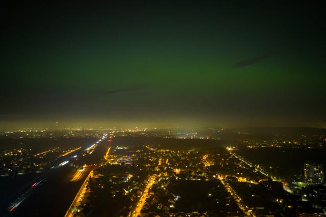 19 January 2026, Duisburg: Green glowing auroras are visible to the naked eye in the evening above Duisburg. Photo: Christoph Reichwein/dpa