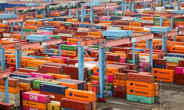 FILED - 26 July 2024, Hamburg: Containers are stored and loaded at the Port of Hamburg. Photo: Christian Charisius/dpa