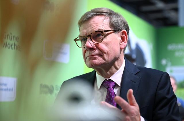 20 January 2026, Berlin: Germany's Foreign Minister Johann Wadephul reacts during a tour of the 90th International Green Week in Berlin, the world's largest trade fair for food, agriculture and horticulture, which is celebrating its 100th anniversary. Photo: Elisa Schu/dpa