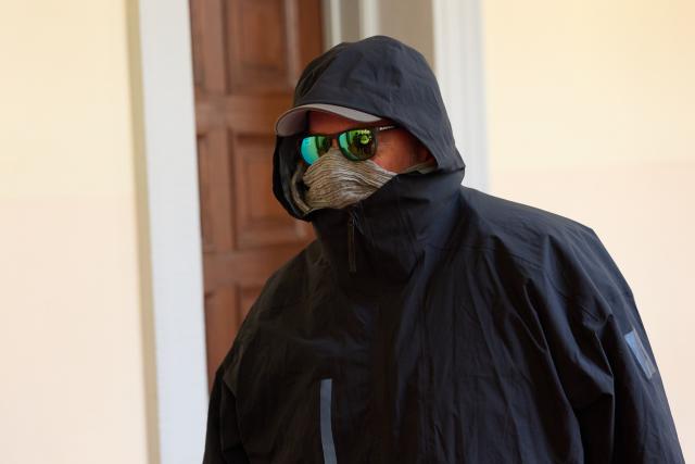 20 January 2026, Hamburg: Defendant P. leaves the district court during a break in the trial for alleged child abduction. In a cloak-and-dagger operation on New Year's Eve 2023/24, two children of the catering entrepreneur Block were taken from Denmark to Germany. The trial for the alleged abduction is taking place at Hamburg District Court, including against Block. Photo: Georg Wendt/dpa