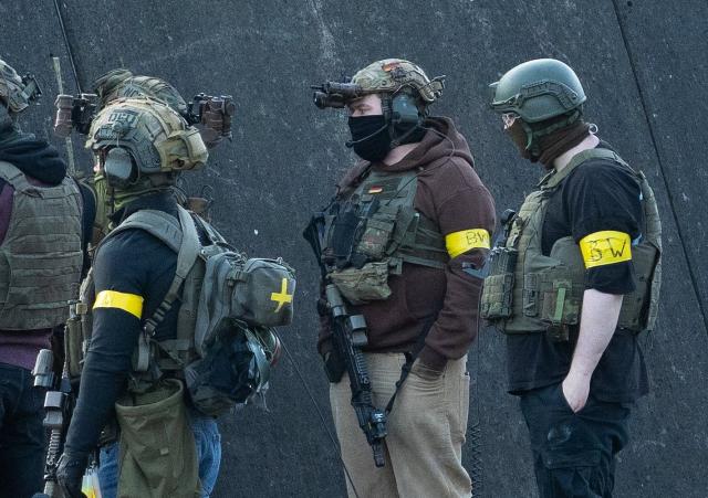20 January 2026, Berlin: Masked members of the German Armed Forces stand at the "MAEusebunker," a former research site in western Berlin, during an exercise to combat enemy agents within Germany. Photo: Wolfram Steinberg/dpa