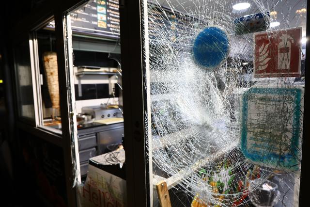 20 January 2026, North Rhine-Westphalia, Dortmund: A view of Syrian restaurant on Brueckstrasse, which vandalized by participants in a pro-Kurdish demonstration under the slogan "Against the killing of innocent people, civilians, and children." Photo: Alex Talash/dpa