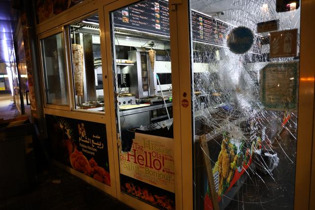 20 January 2026, North Rhine-Westphalia, Dortmund: A view of Syrian restaurant on Brueckstrasse, which vandalized by participants in a pro-Kurdish demonstration under the slogan "Against the killing of innocent people, civilians, and children." Photo: Alex Talash/dpa