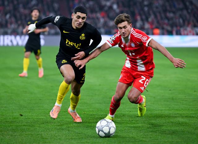 21 January 2026, Bavaria, Munich: Union St. Gilloise'S Anan Khalaili (L) and Bayern Munich's Tom Bischof battle for the ball during the UEFA Champions League soccer match between Bayern Munich and Union St. Gilloise at the Allianz Arena. Photo: Sven Hoppe/dpa