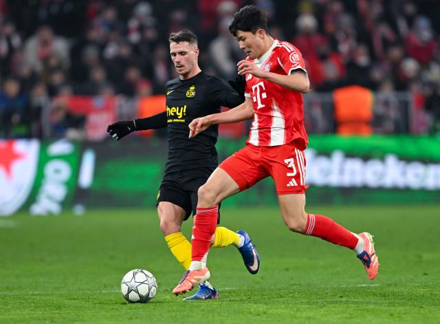 21 January 2026, Bavaria, Munich: Union St. Gilloise's Raul Alexander Florucz (L) and Bayern Munich's Min-jae Kim battle for the ball during the UEFA Champions League soccer match between Bayern Munich and Union St. Gilloise at the Allianz Arena. Photo: Sven Hoppe/dpa