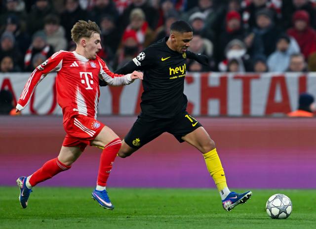 21 January 2026, Bavaria, Munich: Union St. Gilloise's Guilherme Smith (R) and Bayern Munich's Lennart Karl battle for the ball during the UEFA Champions League soccer match between Bayern Munich and Union St. Gilloise at the Allianz Arena. Photo: Sven Hoppe/dpa