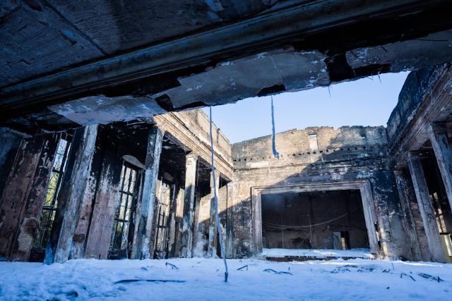 22 January 2026, Brandenburg, Wandlitz: A view of the burnt-out large hall of the teaching building on the Bogensee site, covered in extinguishing foam. The former teaching building belonged to the former Free German Youth (FDJ) college in GDR times. The former villa of Nazi propaganda minister J. Goebbels is also located in the immediate vicinity on the Bogensee site. Photo: Christoph Soeder/dpa