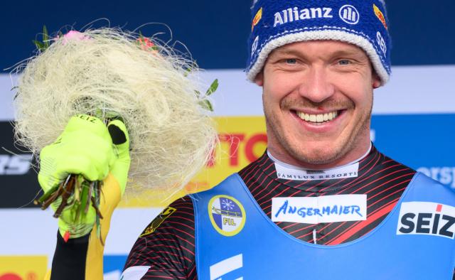 23 January 2026, Thuringia, Oberhof: Germany's Felix Loch celebrates winning the men's singles 2nd round competition at the Luge World Cup. Photo: Robert Michael/dpa