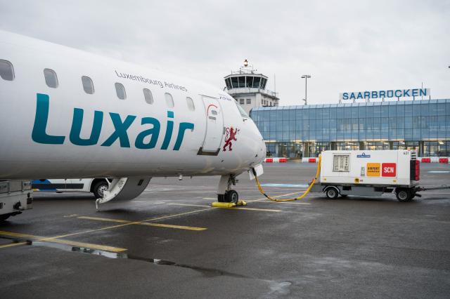 FILED - 06 March 2019, Saarland, Saarbrücken: A Luxair aircraft is standing on the apron of Saarbruecken Airport. Photo: Oliver Dietze/dpa