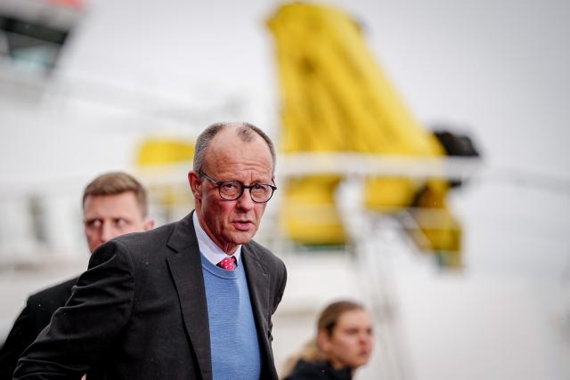 26 January 2026, Hamburg: German Chancellor Friedrich Merz arrives to the summit of the North Sea states in Hamburg. The meeting of heads of government and energy ministers will focus on the expansion of offshore wind farms and other projects in the energy sector. Photo: Kay Nietfeld/dpa