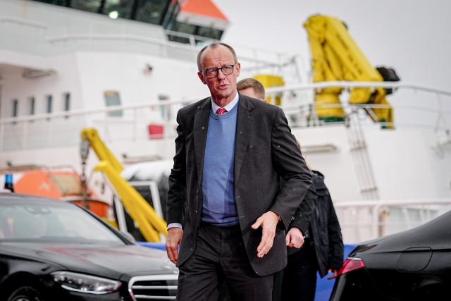 26 January 2026, Hamburg: German Chancellor Friedrich Merz arrives to the summit of the North Sea states in Hamburg. The meeting of heads of government and energy ministers will focus on the expansion of offshore wind farms and other projects in the energy sector. Photo: Kay Nietfeld/dpa