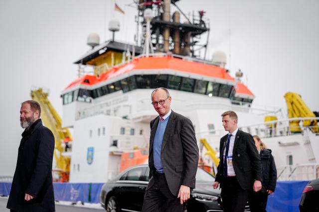 26 January 2026, Hamburg: German Chancellor Friedrich Merz arrives to the summit of the North Sea states in Hamburg. The meeting of heads of government and energy ministers will focus on the expansion of offshore wind farms and other projects in the energy sector. Photo: Kay Nietfeld/dpa