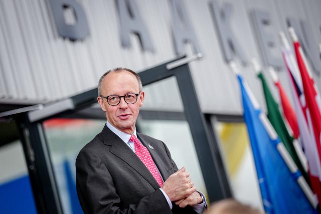 26 January 2026, Hamburg: German Chancellor Friedrich Merz arrives to the summit of the North Sea states in Hamburg. The meeting of heads of government and energy ministers will focus on the expansion of offshore wind farms and other projects in the energy sector. Photo: Kay Nietfeld/dpa