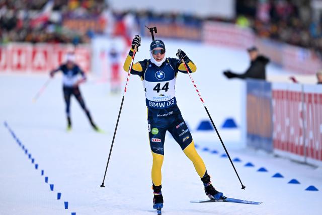 FILED - 17 January 2026, Bavaria, Ruhpolding: Sweden's winner Sebastian Samuelsson crosses the finish line of the Men's 10 km sprint competition of the IBU Biathlon World Cup. Photo: Sven Hoppe/dpa