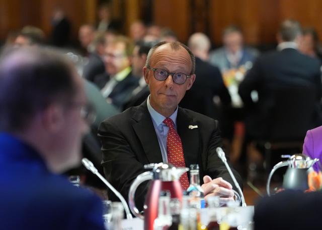25 January 2026, Hamburg: German Chancellor Friedrich Merz sits in a round table discussion of the heads of state and government and energy ministers at the summit of the North Sea states in Hamburg. Photo: Marcus Brandt/dpa