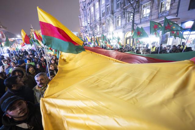 26 January 2026, Hesse, Frankfurt/Main: Kurds protest against the Syrian government and the Turkish government during a demonstration march in the city center. Photo: Boris Roessler/dpa