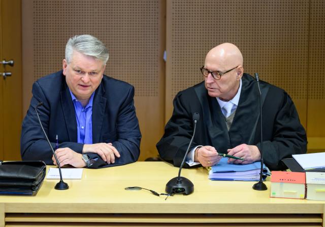 27 January 2026, Brandenburg, Frankfurt_Oder: Wilko Moeller (L), Alternative for Germany (AfD) member of the state parliament and chairman of the AfD Frankfurt, stands next to his defense lawyer Hans-Christoph Jahr at the beginning of the trial at the Frankfurt district court on charges of using publicly banned signs during the 2024 state election campaign. Photo: Patrick Pleul/dpa