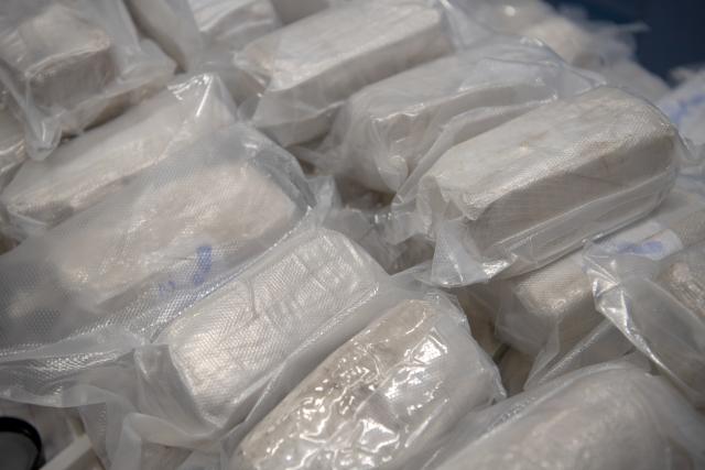 FILED - 25 January 2019, Berlin: Packages with narcotics placed on a table during a press conference of the customs office. Photo: Ralf Hirschberger/dpa