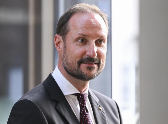 FILED - 21 October 2024, Berlin: The Norwegian Crown Prince Haakon arrives with a plaster on his forehead at a celebration to mark the 25th anniversary of the Nordic Embassies. Photo: Jens Kalaene/dpa