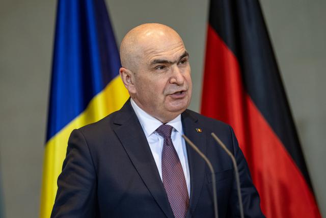 28 January 2026, Berlin: Romanian Prime Minister Ilie Bolojan speaks during a press conference with German Chancellor Friedrich Merz after their meeting at the Federal Chancellery. Photo: Fabian Sommer/dpa
