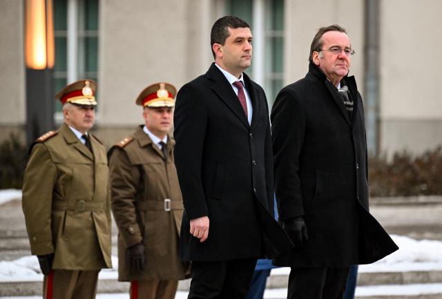 28 January 2026, Berlin: German Minister of Defense Boris Pistorius (R) welcomes his Romanian counterpart Radu-Dinel Miruta ahead of their meeting. Photo: Britta Pedersen/dpa