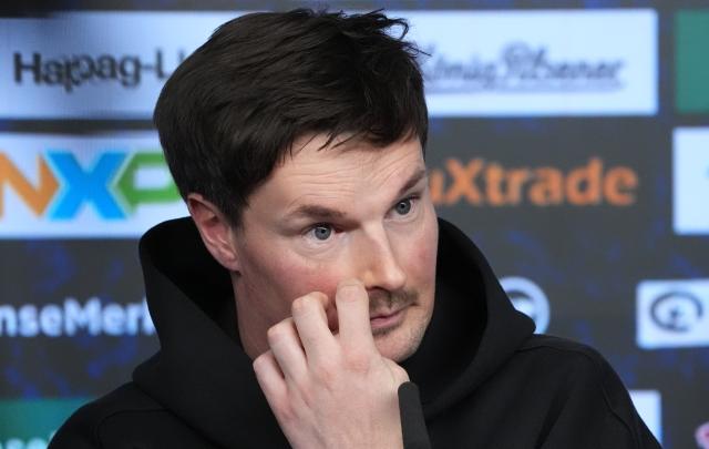29 January 2026, Hamburg: Hamburger SV coach Merlin Polzin reacts during the team's press conference ahead of the German Bundesliga soccer match against Bayern Munich. Photo: Marcus Brandt/dpa
