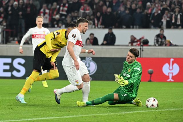 29 January 2026, Baden-Württemberg, Stuttgart: Stuttgart's Ermedin Demirovic scores his side's second goal against Young Boys Bern goalkeeper Marvin Keller during the UEFA Europa League soccer match between VfB Stuttgart and Young Boys Bern at the MHPArena. Photo: Bernd Weißbrod/dpa