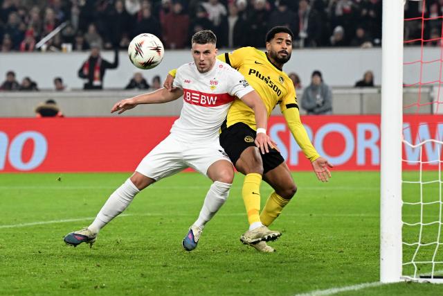 29 January 2026, Baden-Württemberg, Stuttgart: Stuttgart's Ermedin Demirovic (L) and Young Boys Bern's Saidy Janko battle for the ball during the UEFA Europa League soccer match between VfB Stuttgart and Young Boys Bern at the MHPArena. Photo: Bernd Weißbrod/dpa