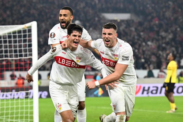 29 January 2026, Baden-Württemberg, Stuttgart: Stuttgart's Chema Andres (C) celebrates scoring his side's third goal with teammates Josha Vagnoman (L) and Ermedin Demirovic during the UEFA Europa League soccer match between VfB Stuttgart and Young Boys Bern at the MHPArena. Photo: Bernd Weißbrod/dpa