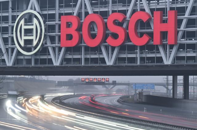 FILED - 29 January 2026, Baden-Württemberg, Gerlingen: The logo of the industrial group Bosch shines above the highway. Photo: Bernd Weißbrod/dpa