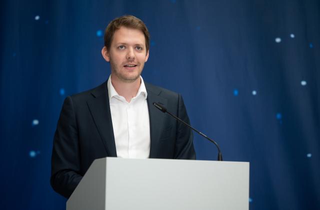 FILED - 28 July 2023, Bavaria, Ottobrunn: Isar Aerospace co-founder Daniel Metzler, speaks during a press conference at the company's premises in Bavaria. Photo: Marijan Murat/dpa
