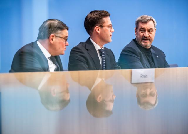 30 January 2026, Berlin: (R-L) Markus Soeder, Minister President of Bavaria, Manuel Hagel, top candidate of the Chrtistian Democratic Union (CDU) in Baden Wuerttemberg, and Boris Rhein, Minister President of Hesse, take part in the press conference of the  "Three Lions Alliance" at the Federal Press Conference Center. Photo: Michael Kappeler/dpa