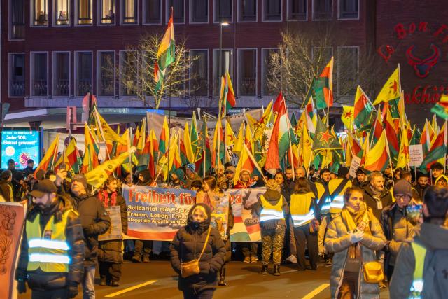 30 January 2026, North Rhine-Westphalia, Dortmund: People walk in a demonstration with the slogan "Against the violence and repression against Kurdish civilians" to draw attention to the situation of the Kurds in north-eastern Syria. Photo: Max Lametz/dpa